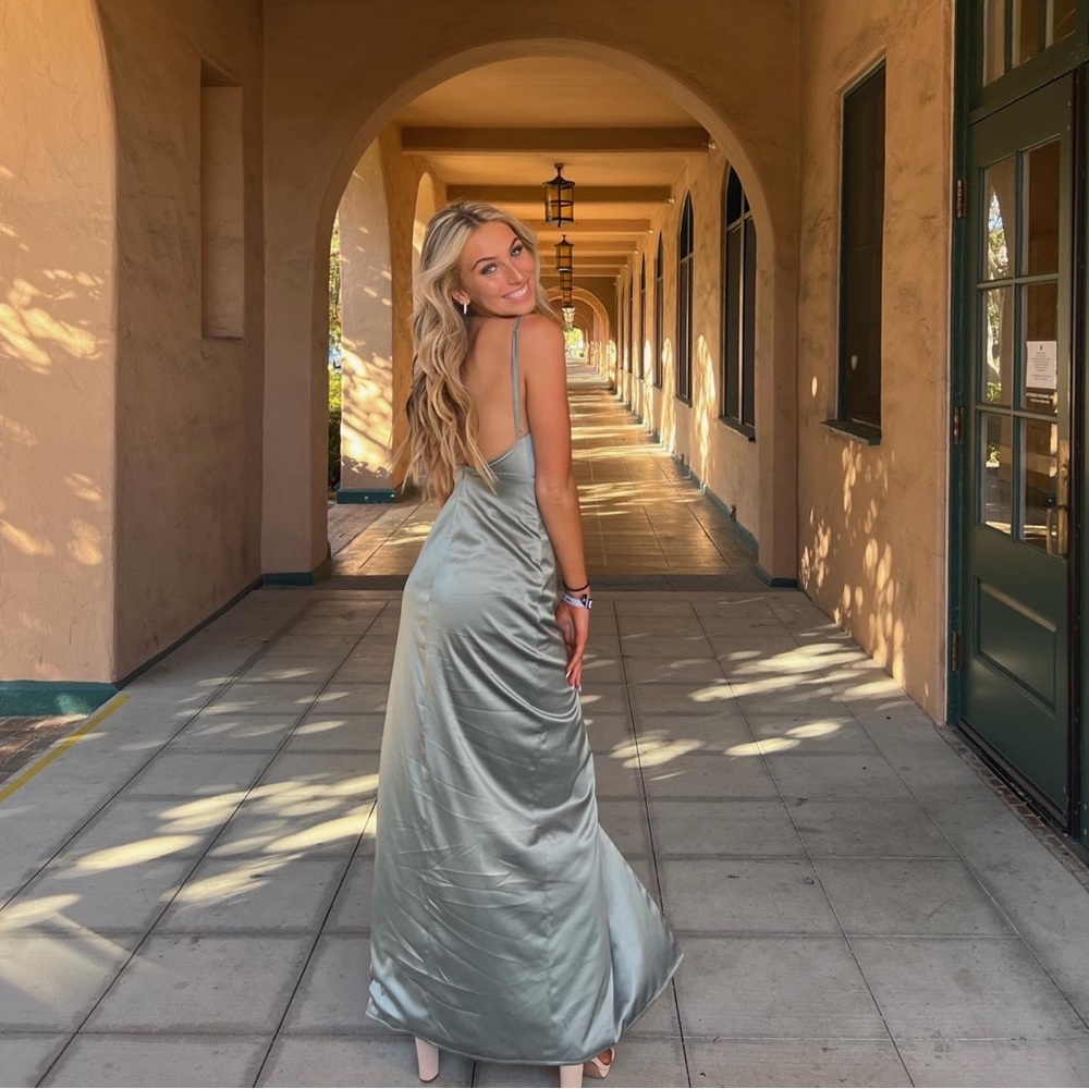 green satin prom dress from begining boutique